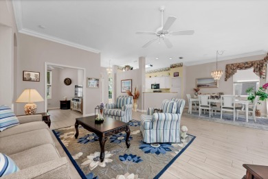 Enjoy breathtaking lake and golf course views from this on Monarch Country Club in Florida - for sale on GolfHomes.com, golf home, golf lot