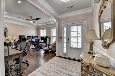 Nestled in a serene cul-de-sac, this meticulously maintained on Reunion Golf Club in Georgia - for sale on GolfHomes.com, golf home, golf lot