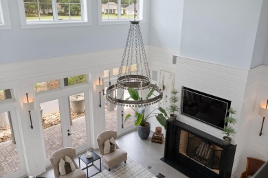 Located on the 13th hole with panoramic views of both the 12th on Haile Plantation Golf and Country Club in Florida - for sale on GolfHomes.com, golf home, golf lot
