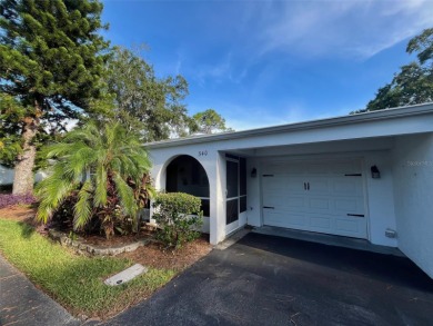 Golf Course Views, Lake Tarpon Strolls, and Minutes to the on Tarpon Woods Golf Club in Florida - for sale on GolfHomes.com, golf home, golf lot