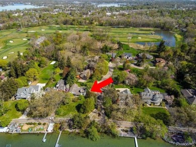Welcome to your dream home on the shores of private all-sports on Pine Lake Country Club in Michigan - for sale on GolfHomes.com, golf home, golf lot