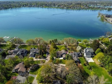 Welcome to your dream home on the shores of private all-sports on Pine Lake Country Club in Michigan - for sale on GolfHomes.com, golf home, golf lot