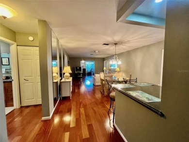 Golf Course Views, Lake Tarpon Strolls, and Minutes to the on Tarpon Woods Golf Club in Florida - for sale on GolfHomes.com, golf home, golf lot