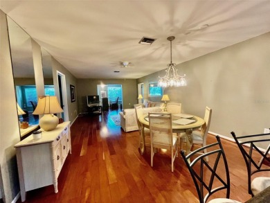 Golf Course Views, Lake Tarpon Strolls, and Minutes to the on Tarpon Woods Golf Club in Florida - for sale on GolfHomes.com, golf home, golf lot