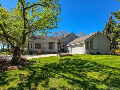 Welcome to your dream home on the shores of private all-sports on Pine Lake Country Club in Michigan - for sale on GolfHomes.com, golf home, golf lot