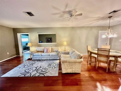 Golf Course Views, Lake Tarpon Strolls, and Minutes to the on Tarpon Woods Golf Club in Florida - for sale on GolfHomes.com, golf home, golf lot