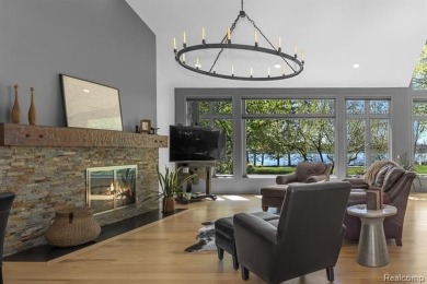 Welcome to your dream home on the shores of private all-sports on Pine Lake Country Club in Michigan - for sale on GolfHomes.com, golf home, golf lot