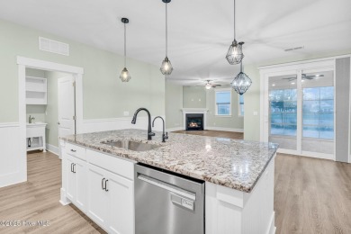 Welcome to 9246 Crossbill Dr. - a beautifully designed 4-bedroom on Cape Fear National At Brunswick Forest in North Carolina - for sale on GolfHomes.com, golf home, golf lot