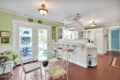 Tucked beneath the canopy of Southport's iconic old-growth oak on The Lakes Country Club in North Carolina - for sale on GolfHomes.com, golf home, golf lot