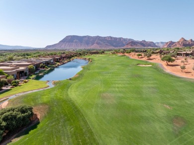 This spectacular home on the 6th Hole of the Entrada Golf Course on Entrada at Snow Canyon in Utah - for sale on GolfHomes.com, golf home, golf lot