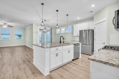 Welcome to 9246 Crossbill Dr. - a beautifully designed 4-bedroom on Cape Fear National At Brunswick Forest in North Carolina - for sale on GolfHomes.com, golf home, golf lot