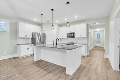 Welcome to 9246 Crossbill Dr. - a beautifully designed 4-bedroom on Cape Fear National At Brunswick Forest in North Carolina - for sale on GolfHomes.com, golf home, golf lot