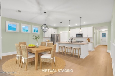 Welcome to 9246 Crossbill Dr. - a beautifully designed 4-bedroom on Cape Fear National At Brunswick Forest in North Carolina - for sale on GolfHomes.com, golf home, golf lot