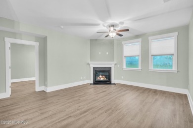 Welcome to 9246 Crossbill Dr. - a beautifully designed 4-bedroom on Cape Fear National At Brunswick Forest in North Carolina - for sale on GolfHomes.com, golf home, golf lot