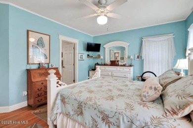 Tucked beneath the canopy of Southport's iconic old-growth oak on The Lakes Country Club in North Carolina - for sale on GolfHomes.com, golf home, golf lot
