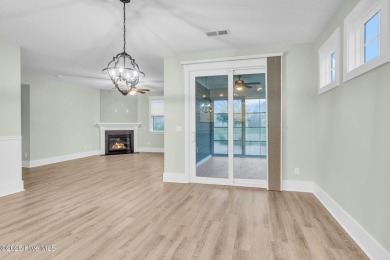 Welcome to 9246 Crossbill Dr. - a beautifully designed 4-bedroom on Cape Fear National At Brunswick Forest in North Carolina - for sale on GolfHomes.com, golf home, golf lot