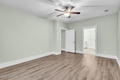 Welcome to 9246 Crossbill Dr. - a beautifully designed 4-bedroom on Cape Fear National At Brunswick Forest in North Carolina - for sale on GolfHomes.com, golf home, golf lot