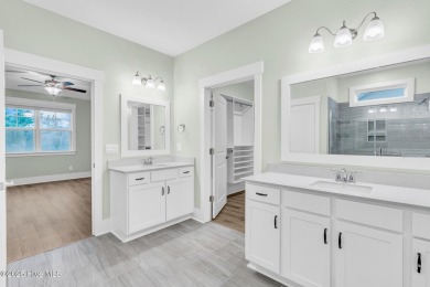 Welcome to 9246 Crossbill Dr. - a beautifully designed 4-bedroom on Cape Fear National At Brunswick Forest in North Carolina - for sale on GolfHomes.com, golf home, golf lot