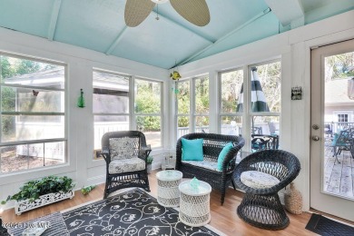 Tucked beneath the canopy of Southport's iconic old-growth oak on The Lakes Country Club in North Carolina - for sale on GolfHomes.com, golf home, golf lot