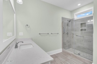 Welcome to 9246 Crossbill Dr. - a beautifully designed 4-bedroom on Cape Fear National At Brunswick Forest in North Carolina - for sale on GolfHomes.com, golf home, golf lot