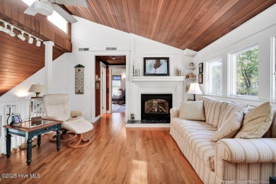 Tucked beneath the canopy of Southport's iconic old-growth oak on The Lakes Country Club in North Carolina - for sale on GolfHomes.com, golf home, golf lot