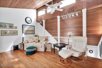 Tucked beneath the canopy of Southport's iconic old-growth oak on The Lakes Country Club in North Carolina - for sale on GolfHomes.com, golf home, golf lot