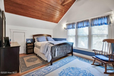 Tucked beneath the canopy of Southport's iconic old-growth oak on The Lakes Country Club in North Carolina - for sale on GolfHomes.com, golf home, golf lot
