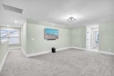Welcome to 9246 Crossbill Dr. - a beautifully designed 4-bedroom on Cape Fear National At Brunswick Forest in North Carolina - for sale on GolfHomes.com, golf home, golf lot