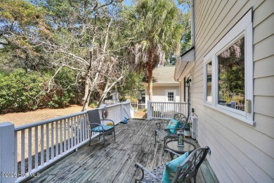 Tucked beneath the canopy of Southport's iconic old-growth oak on The Lakes Country Club in North Carolina - for sale on GolfHomes.com, golf home, golf lot