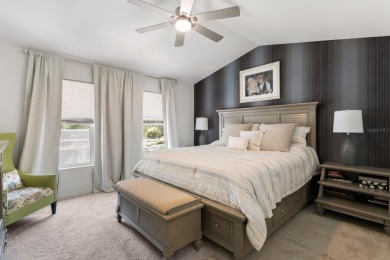 Welcome to true Florida indoor, outdoor, and community living on Hunters Green Country Club in Florida - for sale on GolfHomes.com, golf home, golf lot