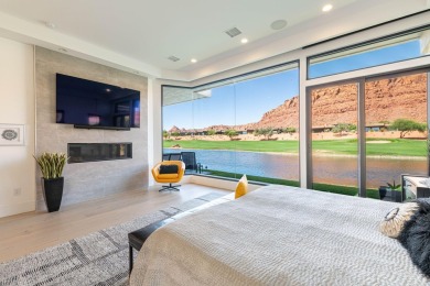 This spectacular home on the 6th Hole of the Entrada Golf Course on Entrada at Snow Canyon in Utah - for sale on GolfHomes.com, golf home, golf lot