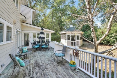 Tucked beneath the canopy of Southport's iconic old-growth oak on The Lakes Country Club in North Carolina - for sale on GolfHomes.com, golf home, golf lot