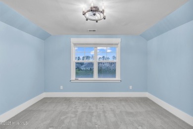 Welcome to 9246 Crossbill Dr. - a beautifully designed 4-bedroom on Cape Fear National At Brunswick Forest in North Carolina - for sale on GolfHomes.com, golf home, golf lot
