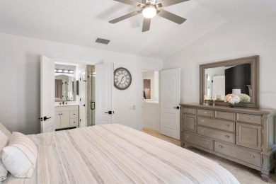 Welcome to true Florida indoor, outdoor, and community living on Hunters Green Country Club in Florida - for sale on GolfHomes.com, golf home, golf lot