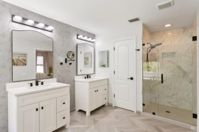 Welcome to true Florida indoor, outdoor, and community living on Hunters Green Country Club in Florida - for sale on GolfHomes.com, golf home, golf lot