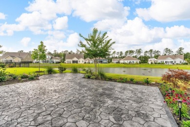 Welcome to 9246 Crossbill Dr. - a beautifully designed 4-bedroom on Cape Fear National At Brunswick Forest in North Carolina - for sale on GolfHomes.com, golf home, golf lot