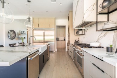 This spectacular home on the 6th Hole of the Entrada Golf Course on Entrada at Snow Canyon in Utah - for sale on GolfHomes.com, golf home, golf lot