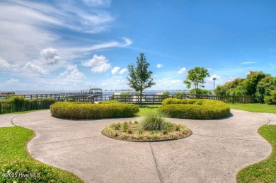 Tucked beneath the canopy of Southport's iconic old-growth oak on The Lakes Country Club in North Carolina - for sale on GolfHomes.com, golf home, golf lot