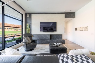 This spectacular home on the 6th Hole of the Entrada Golf Course on Entrada at Snow Canyon in Utah - for sale on GolfHomes.com, golf home, golf lot
