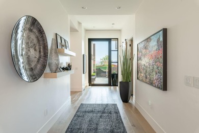 This spectacular home on the 6th Hole of the Entrada Golf Course on Entrada at Snow Canyon in Utah - for sale on GolfHomes.com, golf home, golf lot