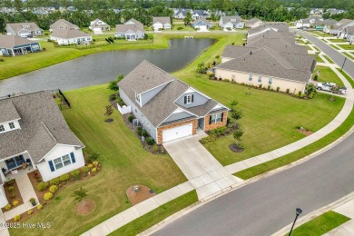 Welcome to 9246 Crossbill Dr. - a beautifully designed 4-bedroom on Cape Fear National At Brunswick Forest in North Carolina - for sale on GolfHomes.com, golf home, golf lot