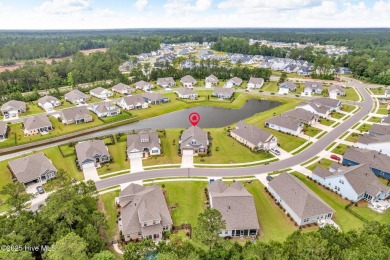 Welcome to 9246 Crossbill Dr. - a beautifully designed 4-bedroom on Cape Fear National At Brunswick Forest in North Carolina - for sale on GolfHomes.com, golf home, golf lot