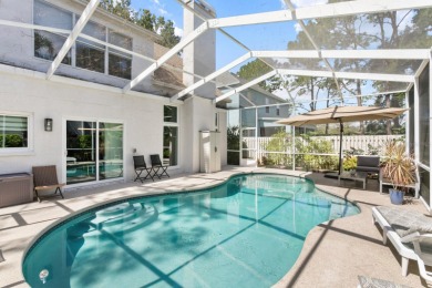 Welcome to true Florida indoor, outdoor, and community living on Hunters Green Country Club in Florida - for sale on GolfHomes.com, golf home, golf lot