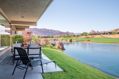 This spectacular home on the 6th Hole of the Entrada Golf Course on Entrada at Snow Canyon in Utah - for sale on GolfHomes.com, golf home, golf lot