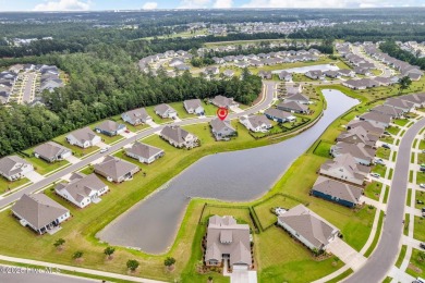 Welcome to 9246 Crossbill Dr. - a beautifully designed 4-bedroom on Cape Fear National At Brunswick Forest in North Carolina - for sale on GolfHomes.com, golf home, golf lot