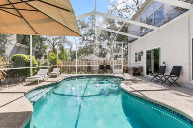 Welcome to true Florida indoor, outdoor, and community living on Hunters Green Country Club in Florida - for sale on GolfHomes.com, golf home, golf lot