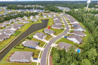 Welcome to 9246 Crossbill Dr. - a beautifully designed 4-bedroom on Cape Fear National At Brunswick Forest in North Carolina - for sale on GolfHomes.com, golf home, golf lot