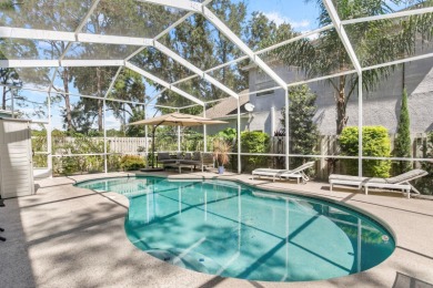 Welcome to true Florida indoor, outdoor, and community living on Hunters Green Country Club in Florida - for sale on GolfHomes.com, golf home, golf lot