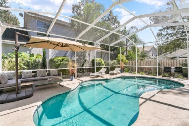 Welcome to true Florida indoor, outdoor, and community living on Hunters Green Country Club in Florida - for sale on GolfHomes.com, golf home, golf lot