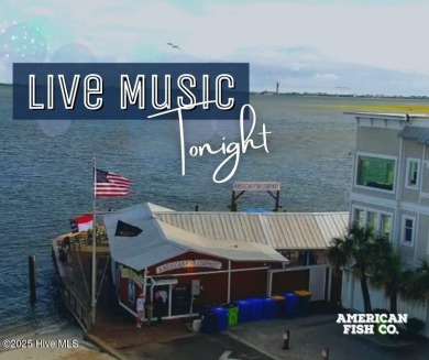 Tucked beneath the canopy of Southport's iconic old-growth oak on The Lakes Country Club in North Carolina - for sale on GolfHomes.com, golf home, golf lot